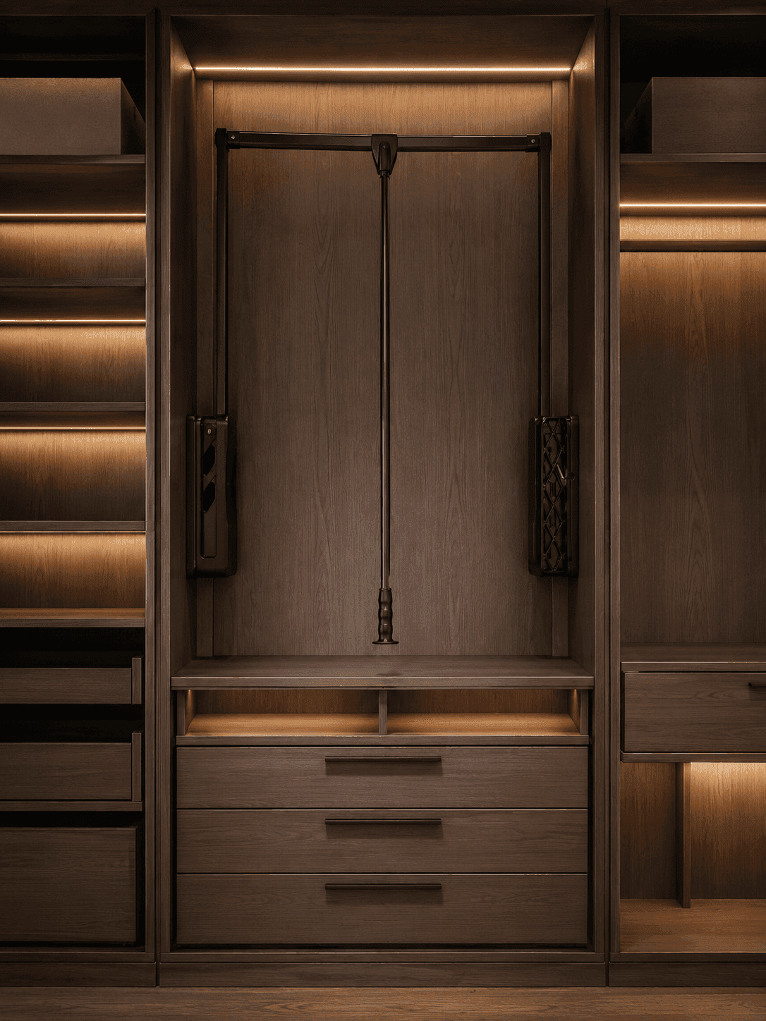 Pull down closet rod for easy access to high hanging garments