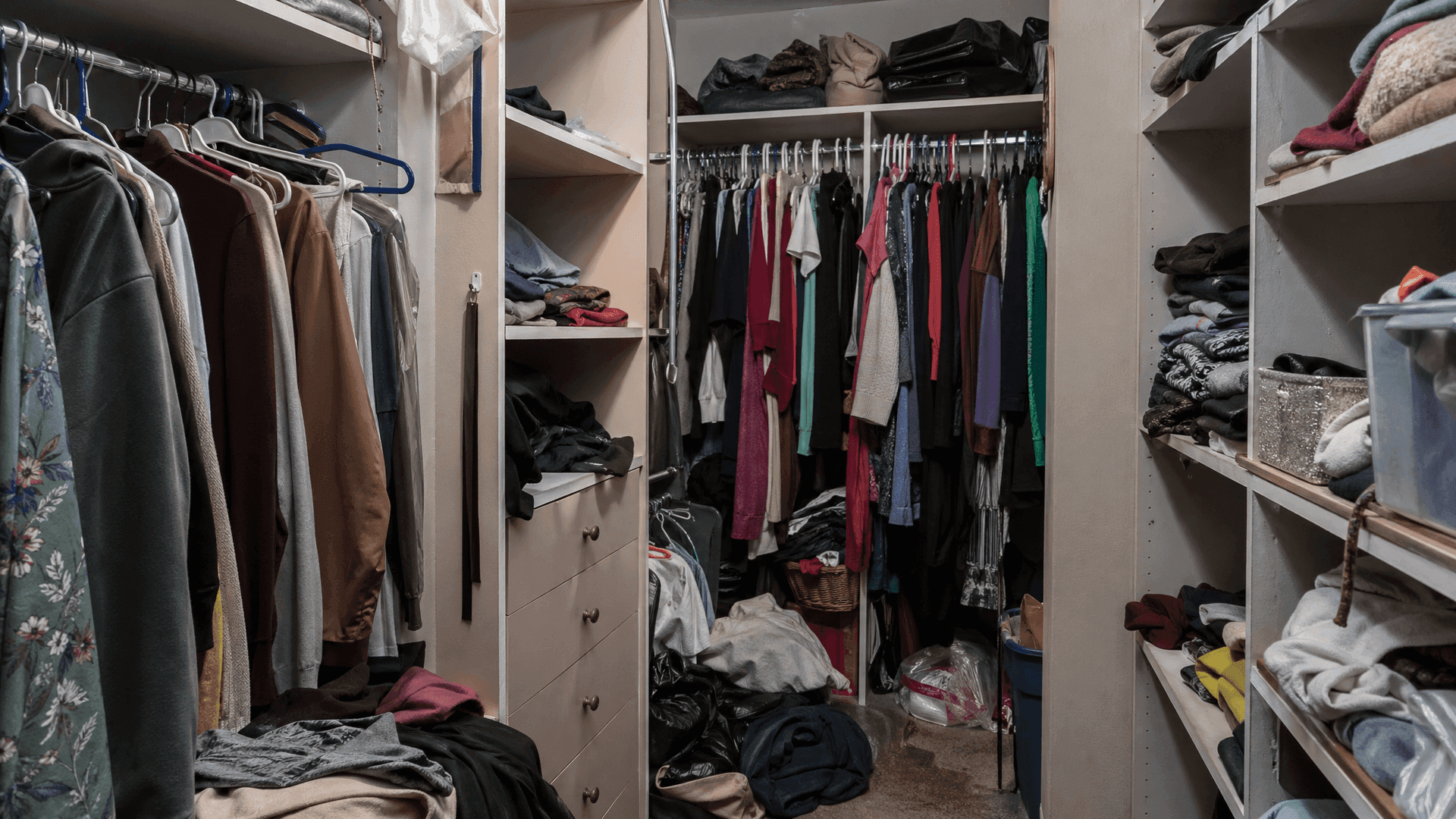 Man frustrated with messy closet